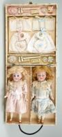 Pair of Kammer & Reinhardt/S&H bisque head dolls in case with layette, German circa 1910,