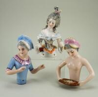 Three larger size glazed china half-dolls,