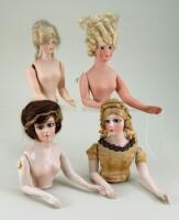 Four larger size bisque half-dolls,