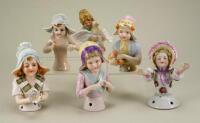 Selection of glazed china Children half-dolls,