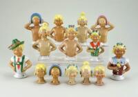 Collection of glazed china Tan Faced Child half-dolls,