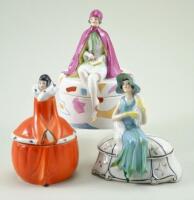 Three glazed china Deco dressing table boxes, 1920s,