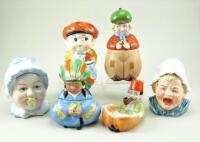 Five dressing table head figurine boxes, 1920s/30s,