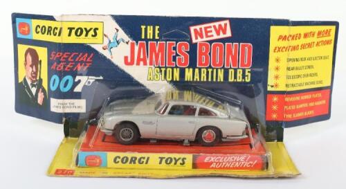 Corgi Toys 270 James Bond Aston Martin D.B.5 1st Edition silver with tyre slasher