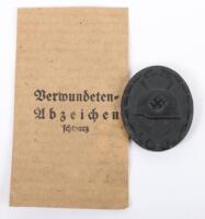 WW2 German Black Wound Badge in Paper Packet of Issue by Overhoff & Cie Ludenscheid