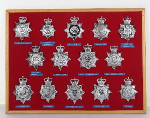 Fourteen Obsolete Police Queens Crown Helmet Plates