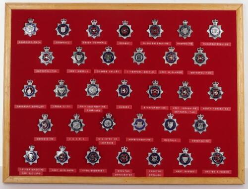 Collection of Thirty Three Obsolete Police Blue Ring Cap Badges