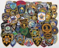 Collection of One Hundred Obsolete USA Police Cloth Patch Badges