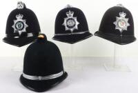 Four obsolete Police Helmets