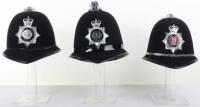 Three obsolete police helmets