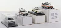 Four Hand built white metal Police Vehicles