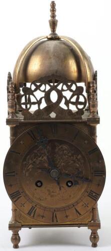 A 17th century style brass lantern clock