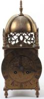 A 17th century style brass lantern clock