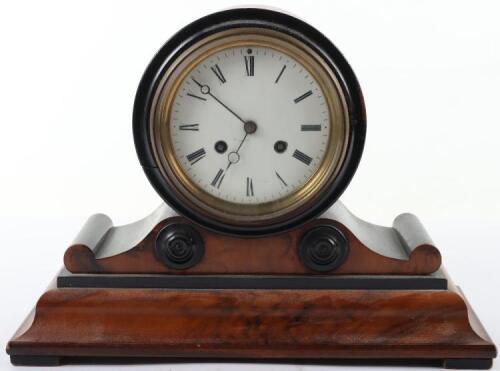 A Regency walnut and ebonised mantle clock