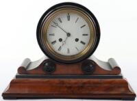 A Regency walnut and ebonised mantle clock