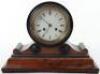 A Regency walnut and ebonised mantle clock