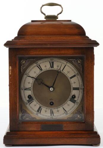 An Elliott of London oak cased Georgian style mantel clock