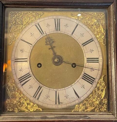 A rare 18th century four pillar longcase clock, brass and silvered dial signed Edmund Massey London