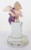 A Meissen porcelain figural group of Putti in the Michel Victor Acier style