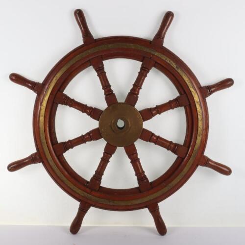 A brass and oak ships wheel by Mactaggart Scott & Co Ltd Edinburgh
