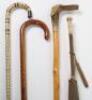 A group of walking canes and sticks, including a shark vertebrae stick, - 3