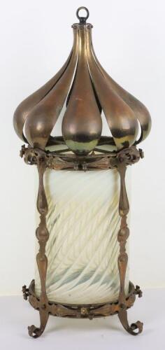 An Art Nouveau brass and glass lantern