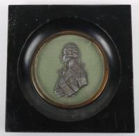 A 19th century portrait miniature in relief of Admiral Nelson in silvered metal