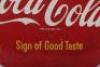 A Coca-Cola circular button sign ‘Drink Coca-Cola Sign of Good Taste’ - 2