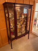 An Edwardian mahogany glazed breakfront display cabinet