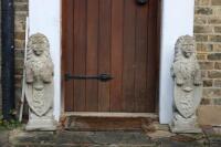 A pair of early 20th century stone lions