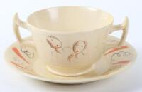 A Clarice Cliff for Wilkinson Bizarre pattern cup and saucer by Laura Knight