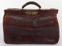 An early 20th century leather doctors bag