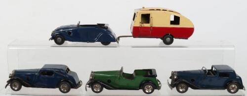 Four Tri-ang Minic clockwork cars