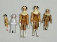 Three miniature painted wooden Grodnertal dolls, German 1830s,