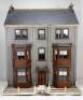 ‘Idaville’ a well-made three storey wooden Dolls House with original contents, made by Percy Platnauer circa 1912,