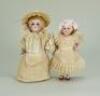 Pair of good all-bisque miniature dolls, German 1890s,