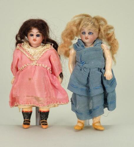 A pair of Simon & Halbig miniature bisque head dolls, German circa 1910,