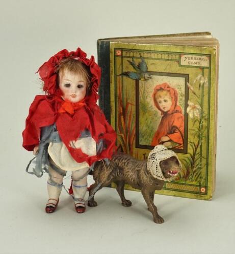 Miniature all bisque ‘Little Red Riding Hood’ doll, German circa 1915,