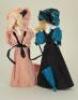 Pair of German bisque shoulder head Christmas Cracker dolls,