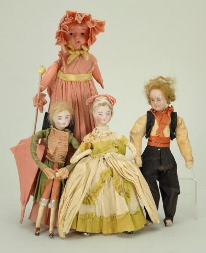 Four German Christmas Cracker dolls,