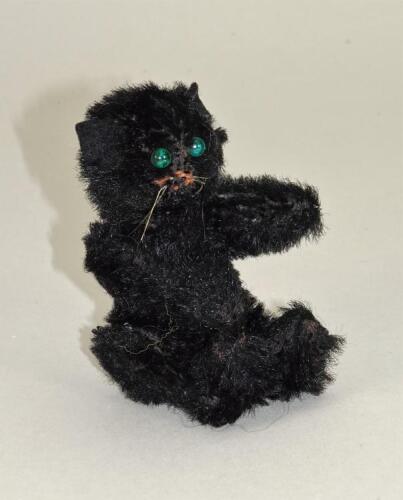 A Farnell WW1 black cat mascot,