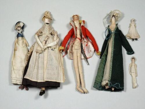 A rare and unusual group of miniature early English cloth and leather dolls, circa 1810,