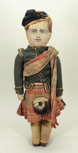 Unusual oil painted cloth doll in traditional Scottish uniform, probably American late 19th century,