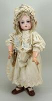 Beautiful and early Eden Bebe bisque head doll, French 1890s,