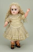 Small size Tete Jumeau bisque head Bebe doll in original clothes, French circa 1885,