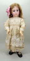 Rare and Large Jumeau Triste or ‘Long face’ bisque head Bebe doll, French circa 1880,