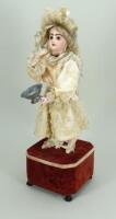 A ‘Little girl blowing Bubbles’ Roullet & Decamps Jumeau bisque head automata, French circa 1880,