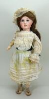 Limoges bisque head doll, French circa 1915,