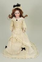 A bisque shoulder head doll, possibly Kestner, German circa 1890,