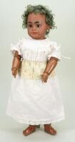 Simon & Halbig 1009 mulatto bisque head doll, German circa 1900,